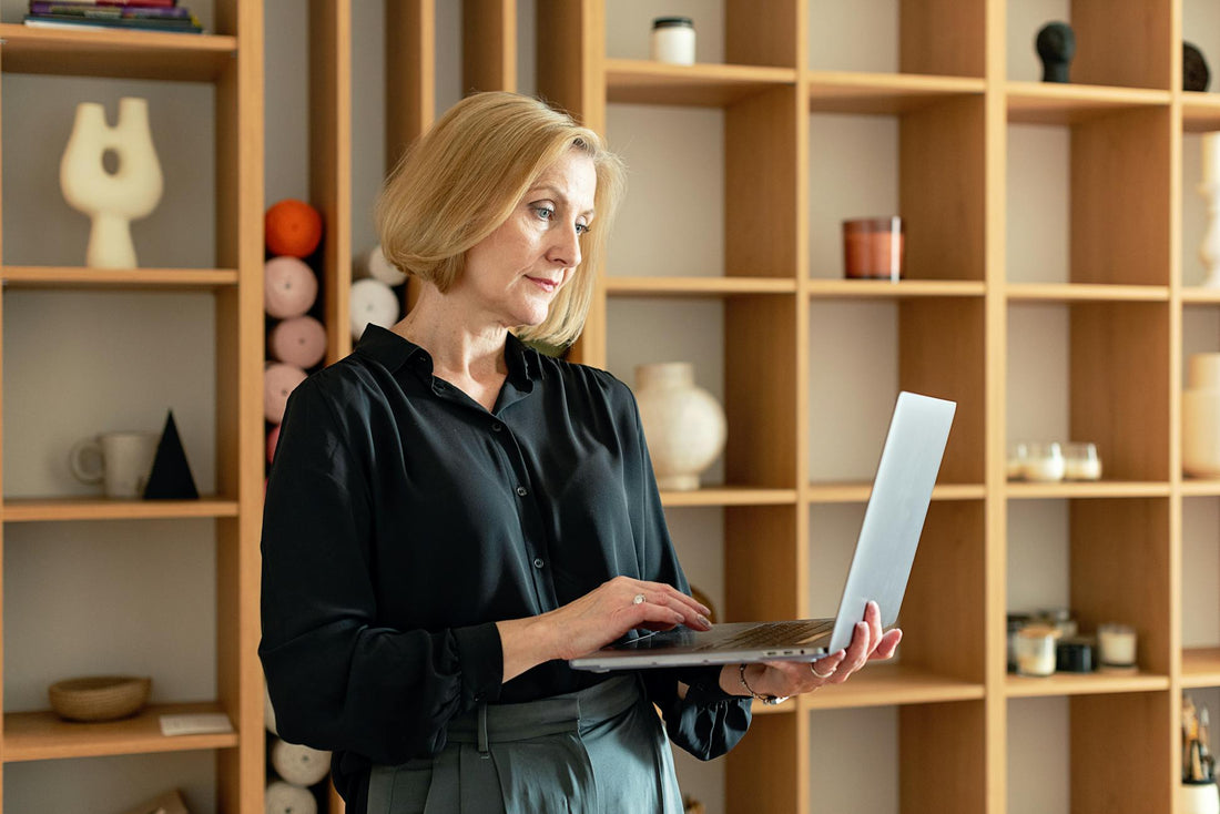 Older woman safely using a laptop